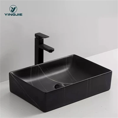 Bassin de meuble-lavabo au-dessus du comptoir en céramique